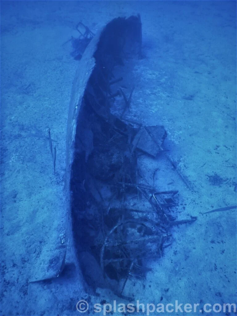 Wreck of a little sailboat in the waters of the Canary Islands
