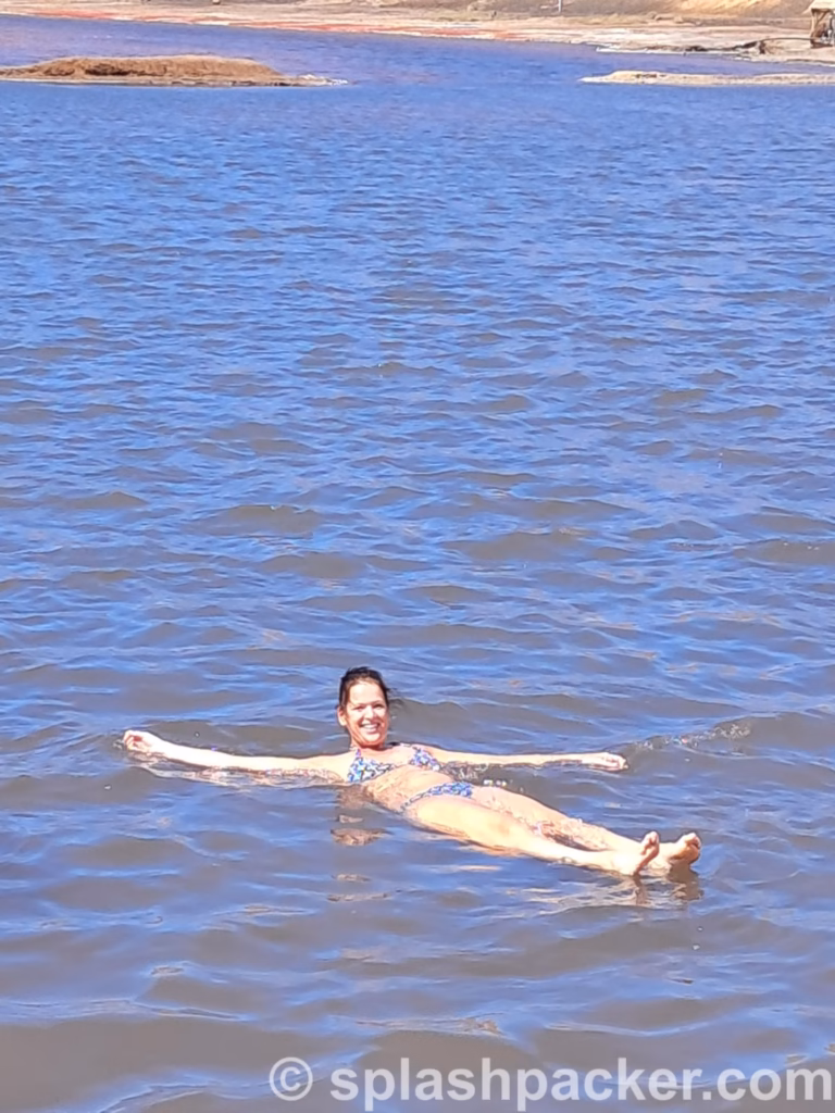 Floating in the salt lake of Pedra de Lume on Sal Island in Cape Verde